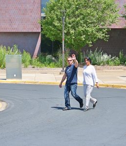 Michael Rhedin and Sandra Grazzini-Rucki leave the courthouse during a break in the trial.